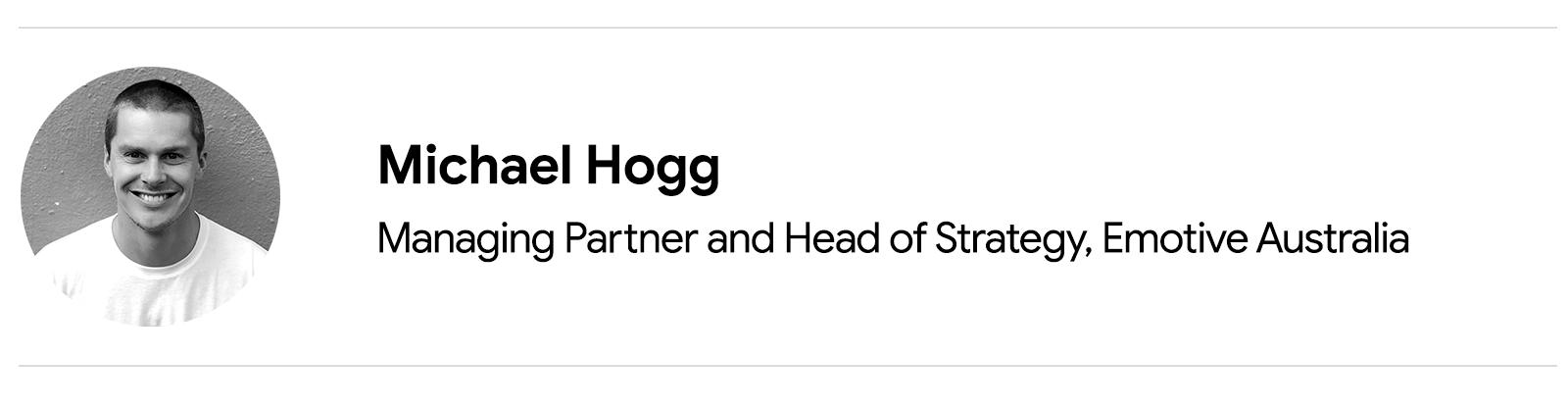 An executive headshot of a man smiling at the camera. Michael Hogg, Managing Partner and Head of Strategy, Emotive Australia