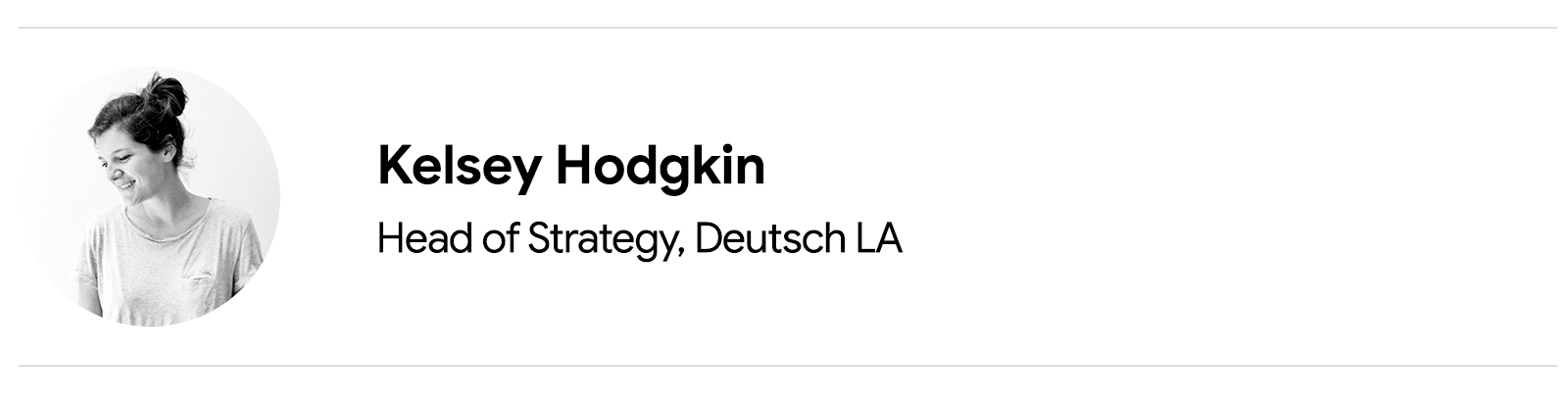 Ein Porträtfoto einer Frau, die seitlich nach unten blickt. Kelsey Hodgkin, Head of Strategy, Deutsch LA