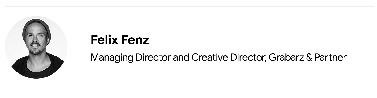 Ein Porträtfoto eines Mannes, der in die Kamera lächelt. Felix Fenz, Managing Director und Creative Director, Grabarz & Partner