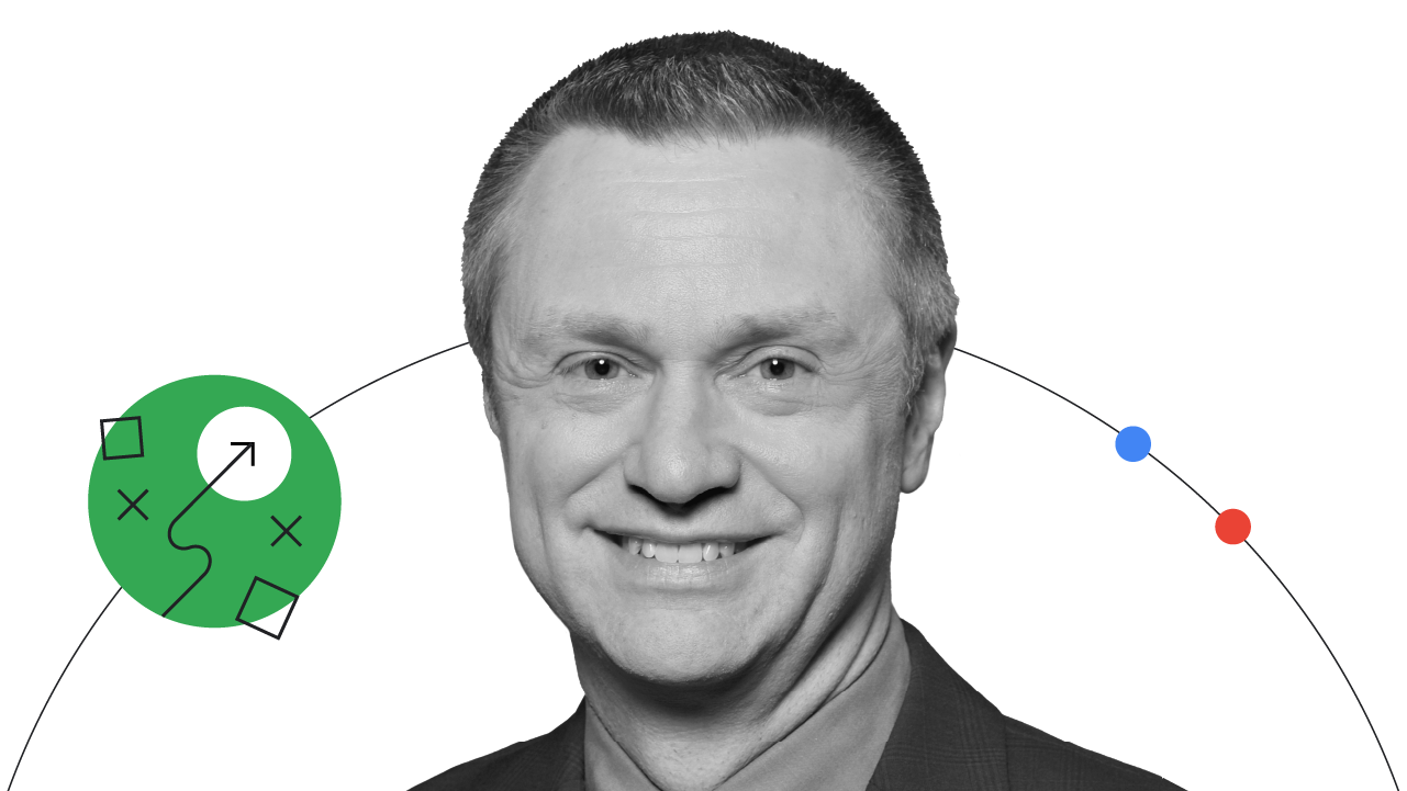 Professor and author Jim Lecinski is pictured from the shoulders up, smiling. Lecinski has medium hair, light eyes and skin, and wears a dark suit with a medium-tone shirt. A thin black line with three dots in green, blue, and red circles the photo.