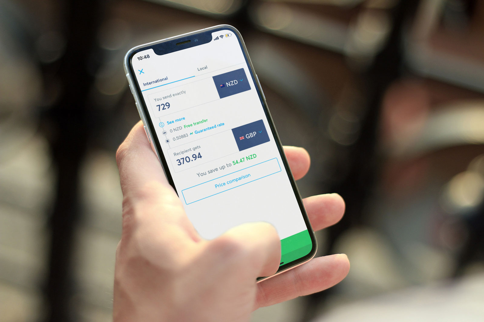 A photo of a phone screen, showing a page from the Wise app as someone is transferring money. The page shows that this is a fee free transfer.