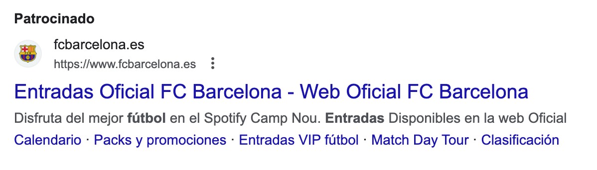 Ejemplo de anuncio de Google Ads del FC Barcelona donde se lee Entradas Oficial FC Barcelona Web Oficial y el escudo del equipo.